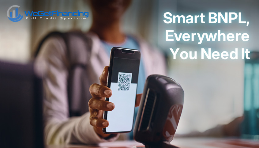 Customer using a mobile phone to complete an in-store BNPL payment with WeGetFinancing.